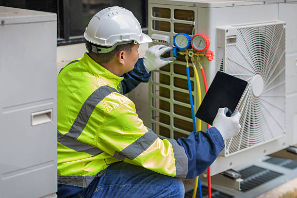 Professional Emergency Ac Repair technician working in Hathorne, MA